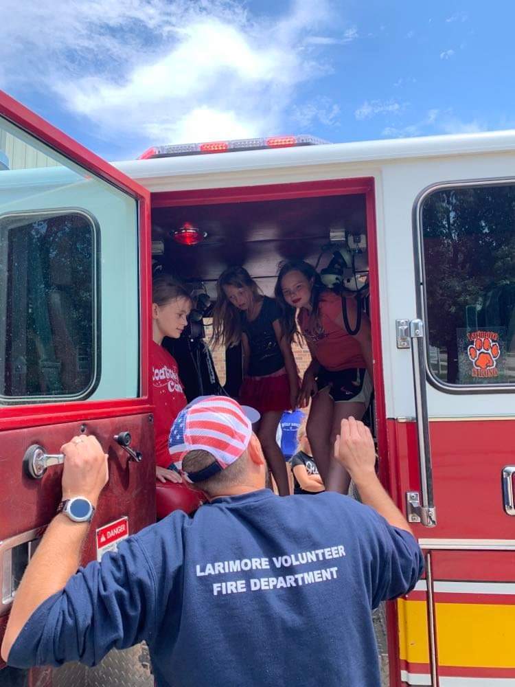 the kids on the fire truck.