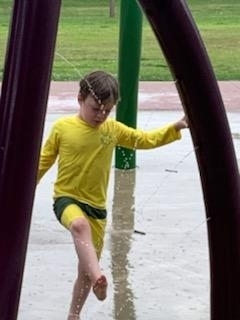 getting wet in the splash park