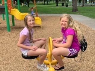 2 girls on the tweeter totter