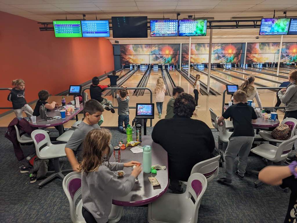 Students bowling.