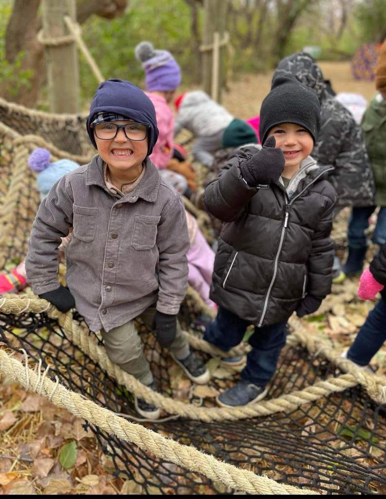 2 kids on the spider web.