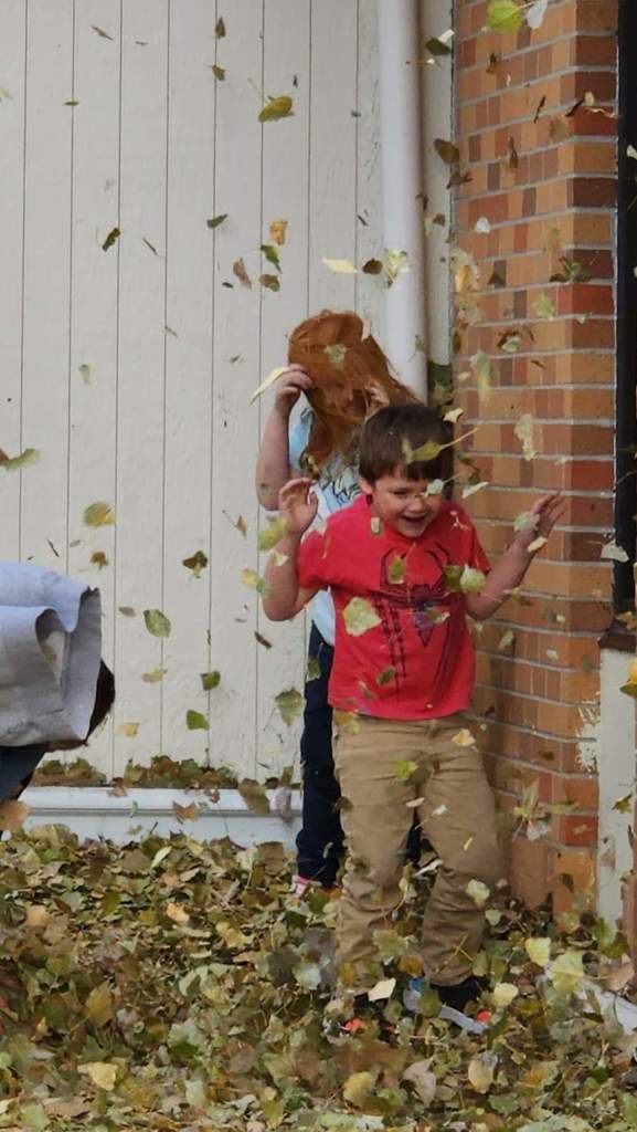 Having fun in the leaves.