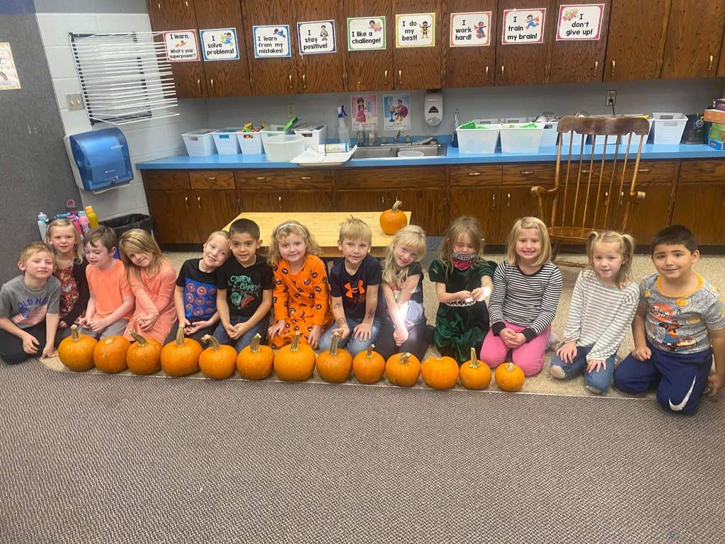 Kindergarten and their pumpkins