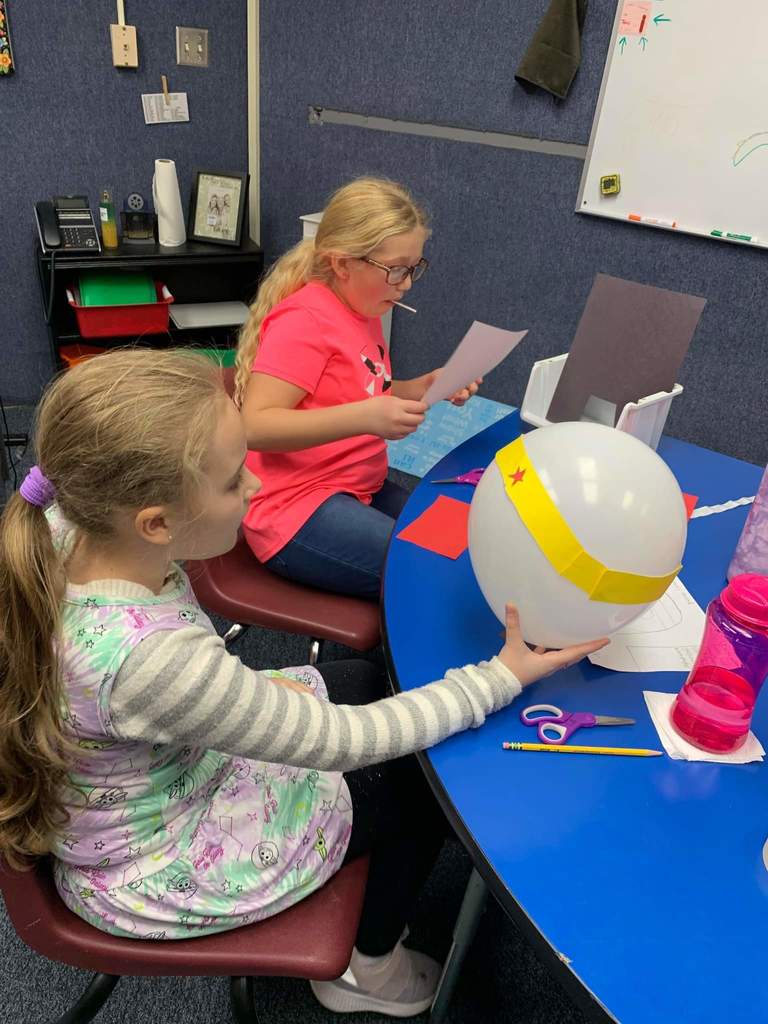 Students working on their balloon character.