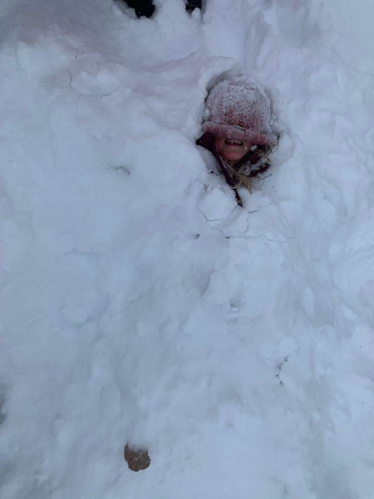 A friend buried in the snow.
