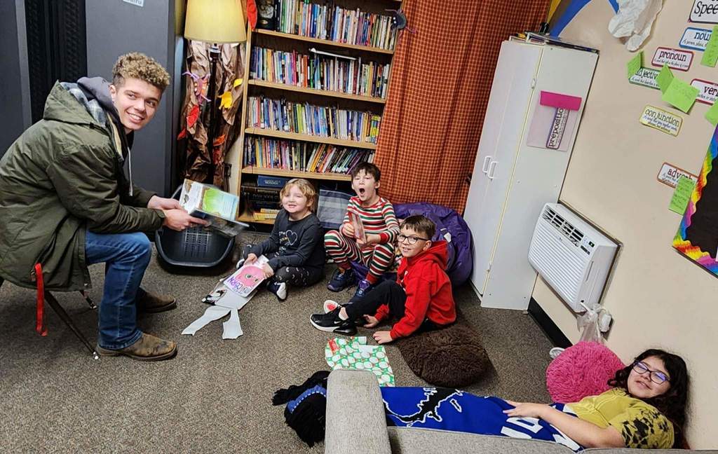 Kids enjoying books.