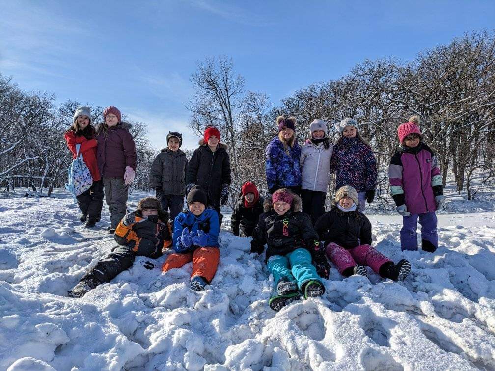 The 3rd graders are ready to sled.