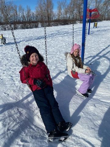 Students swinging.