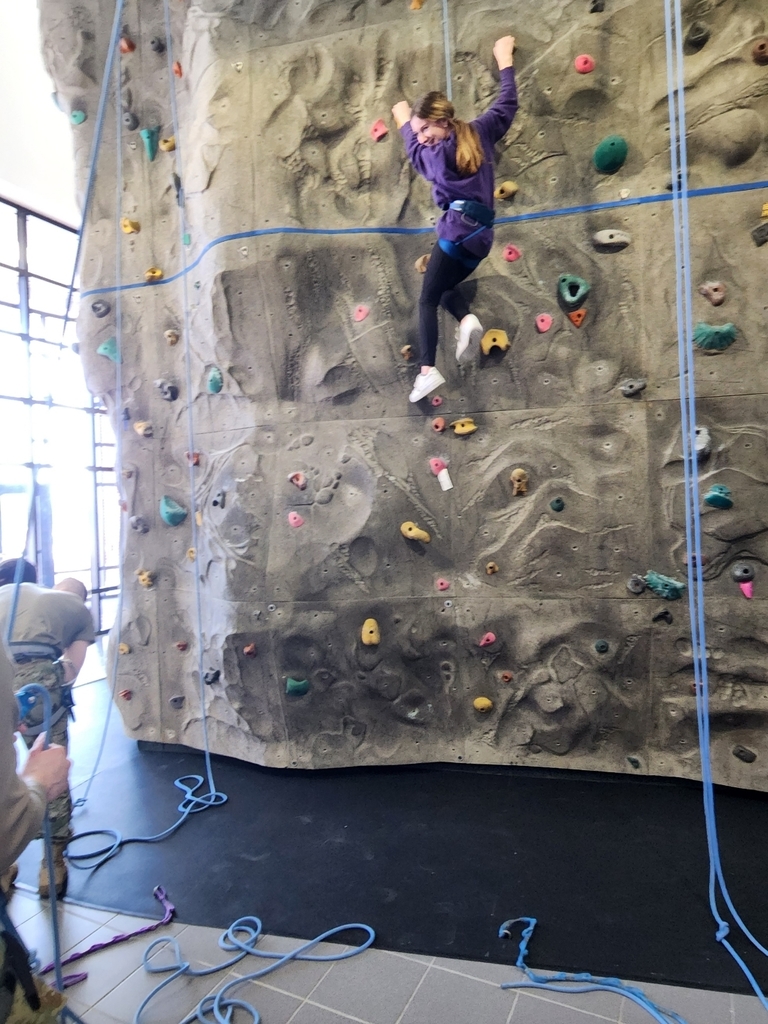 a girl climbing 
