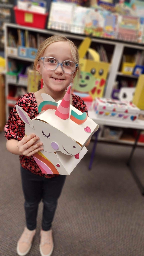 a girl and her unicorn box