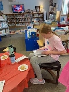 a student enjoying a book