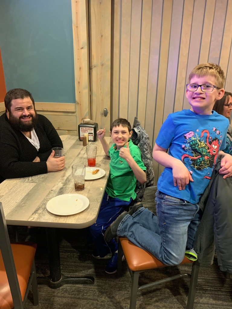 pastor Jamie and boys eating pizza