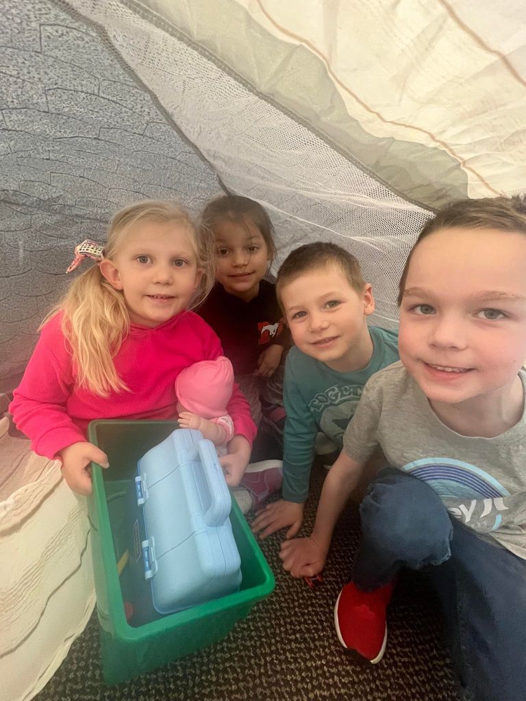 Preschool reading in a tent