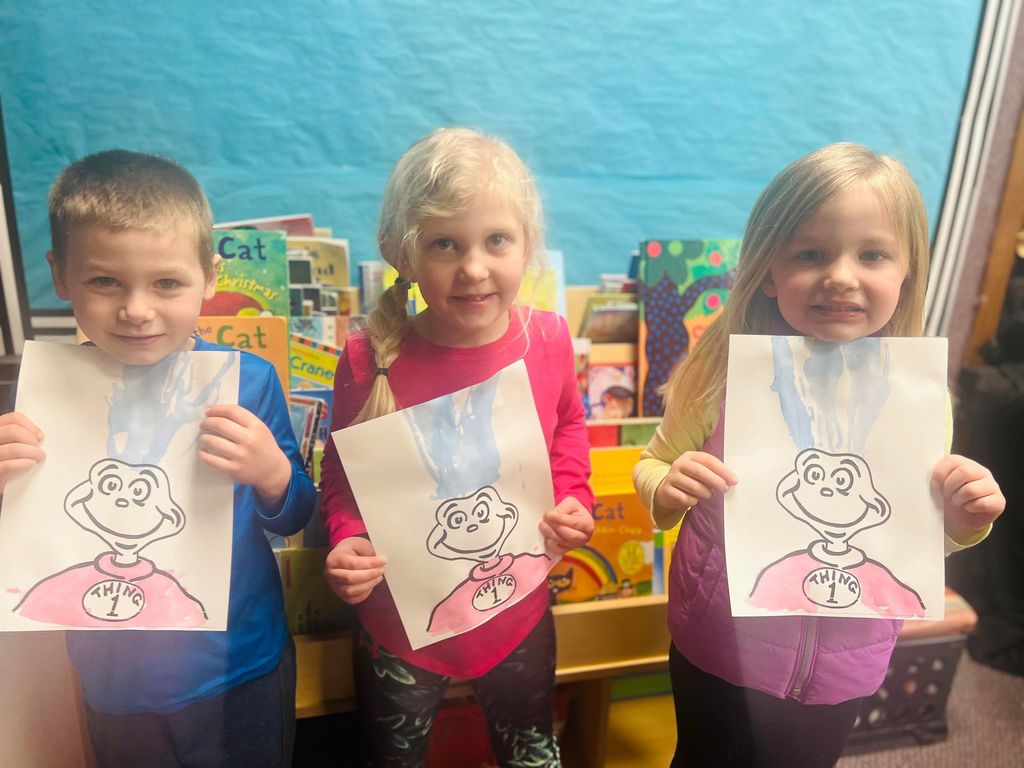 kids with their Thing 1 paintings