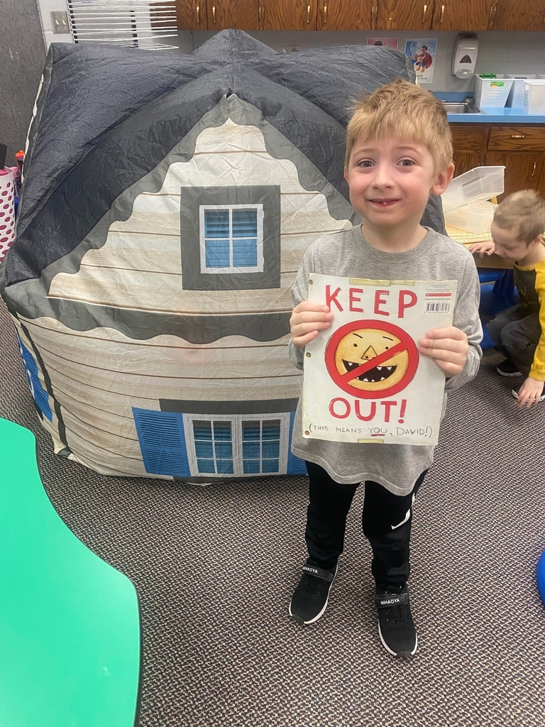 a boy and his keep out sign