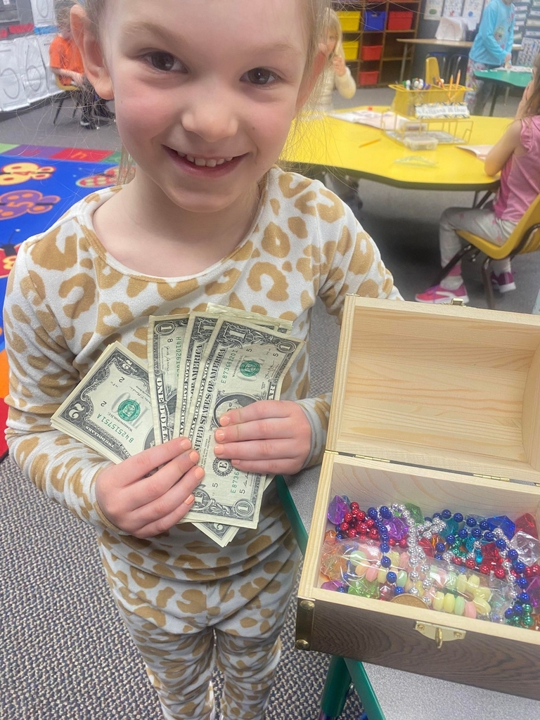 a student with her money and treasure chest
