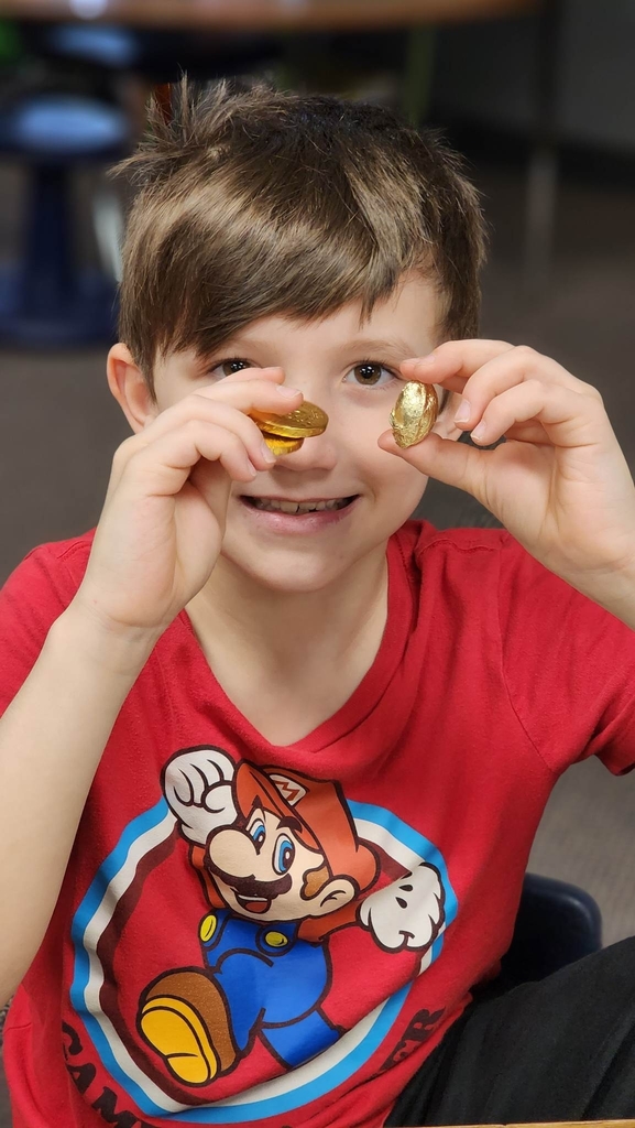 a boy with gold coins