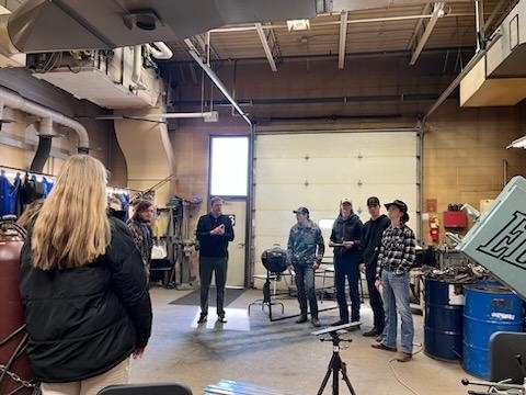 students listened to the votech presentation.