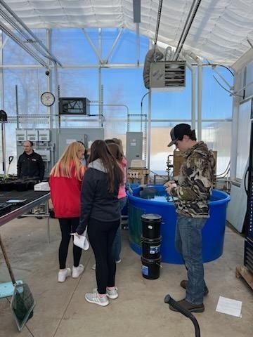 students learning about the Greenhouse.