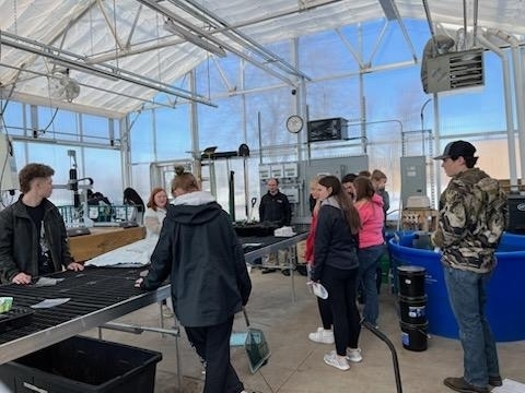 students learning about the greenhouse