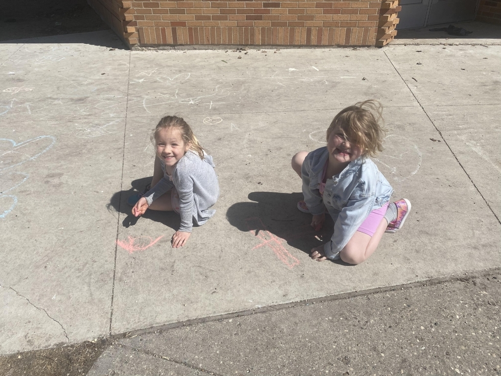 girls with sidewalk chalk