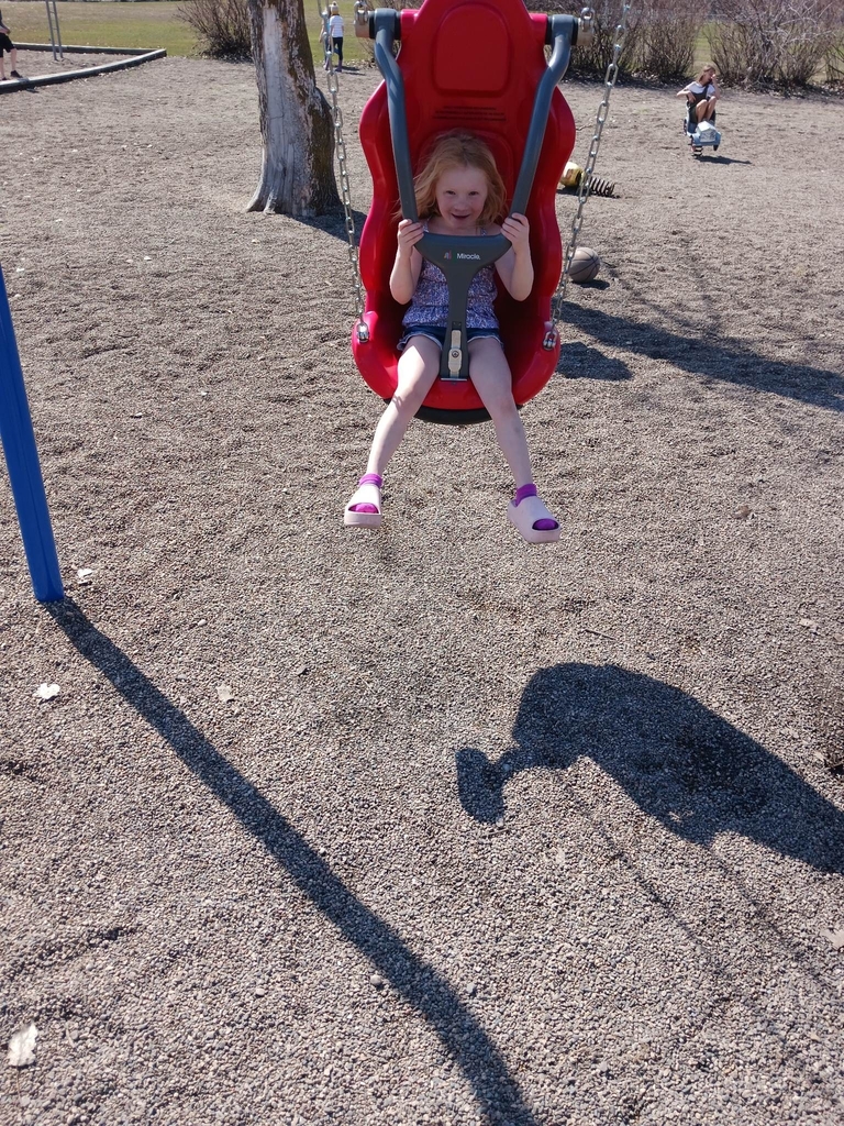a girl swinging