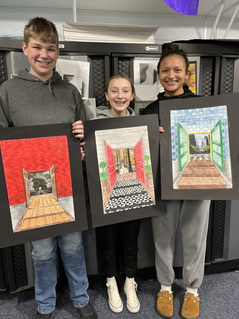 3 students and their vanishing point art work