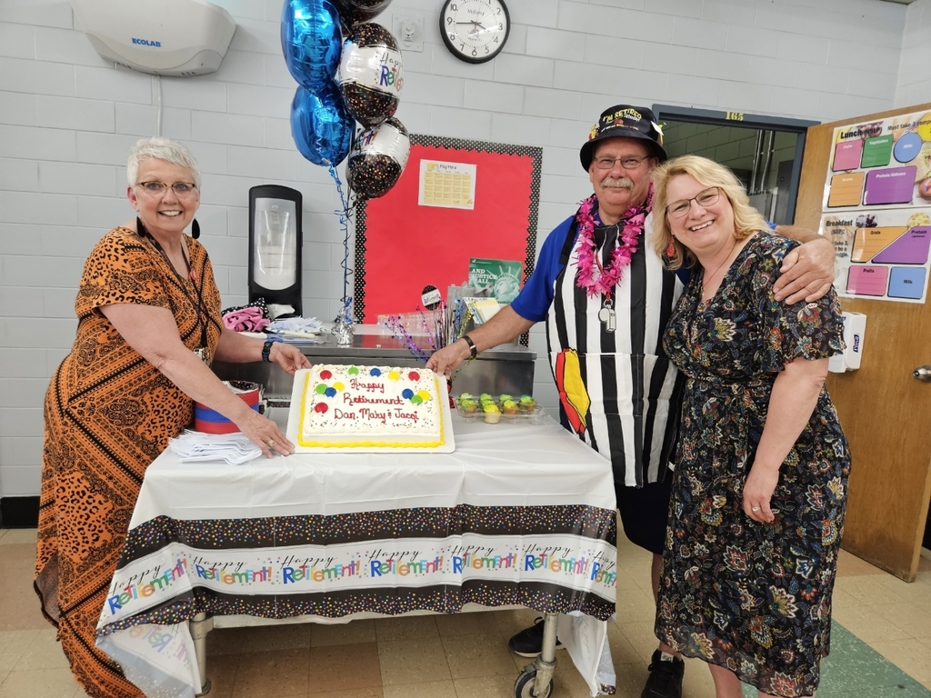 the 3 teachers and their cake.