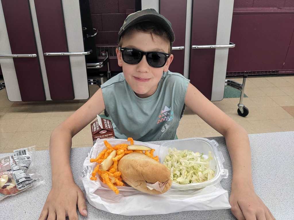 a kid with his lunch.